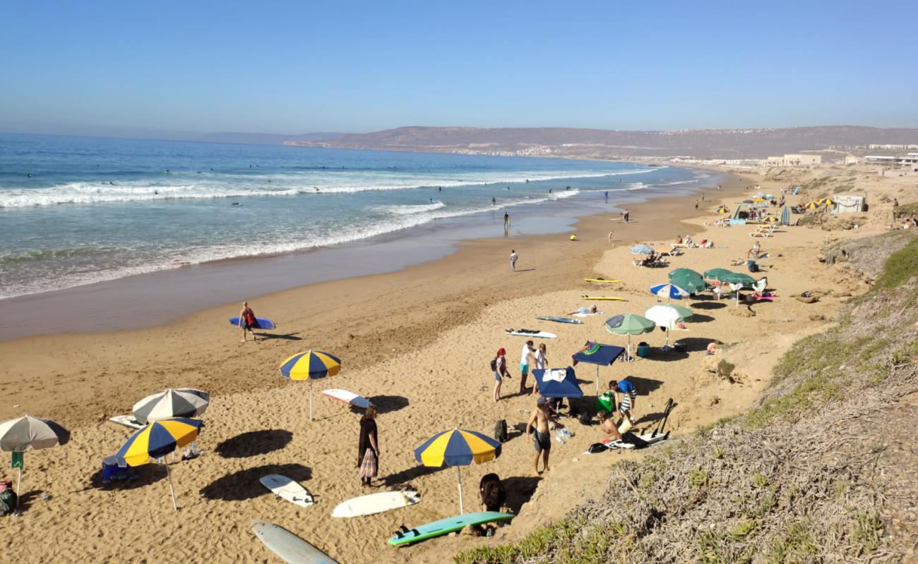 Taghazout Plajı'in fotoğrafı parlak ince kum yüzey ile