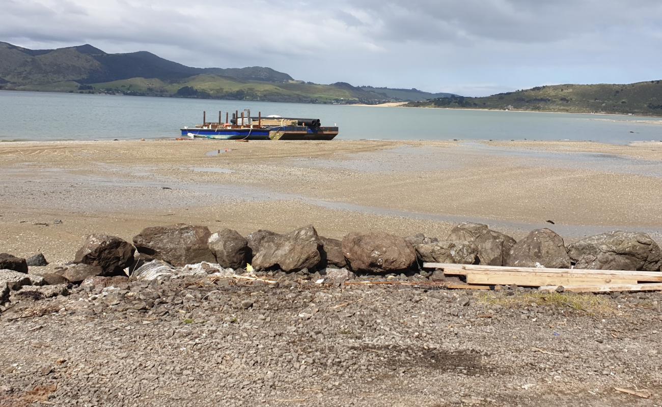 Panguru Beach'in fotoğrafı bej kum ve çakıl yüzey ile