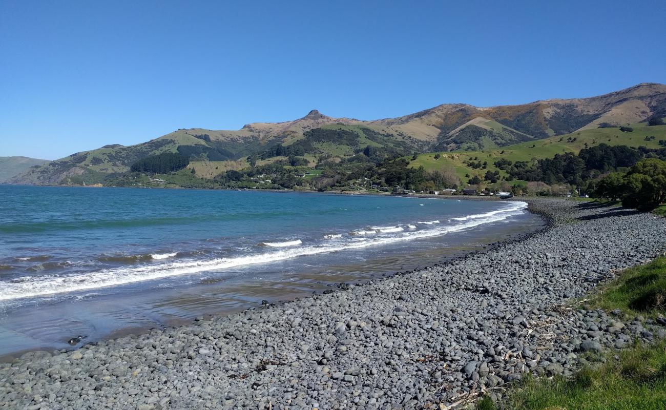 Wainui Beach'in fotoğrafı gri çakıl taşı yüzey ile
