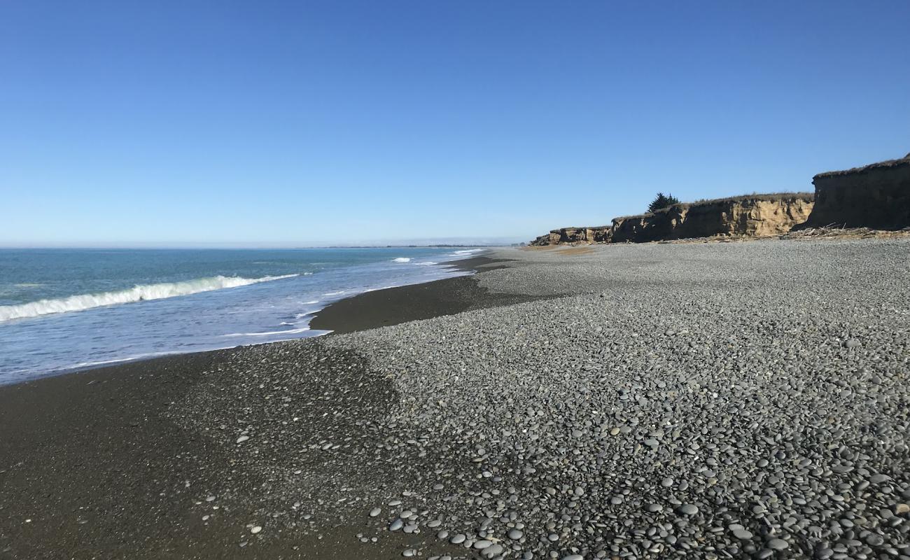Occult Beach'in fotoğrafı gri çakıl taşı yüzey ile