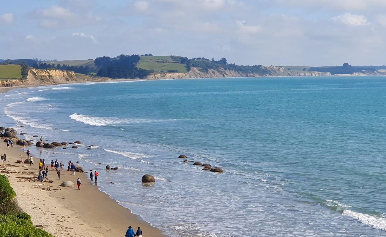 Moeraki Boulders Beach'in fotoğrafı parlak kum yüzey ile