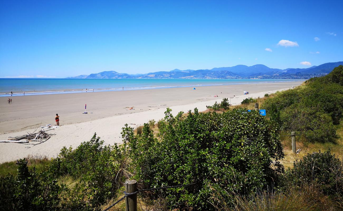 Moturoa Rabbit Beach'in fotoğrafı açık bej kum yüzey ile