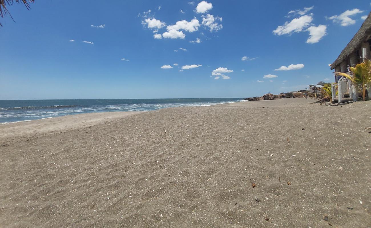 Las Penitas beach'in fotoğrafı gri kum yüzey ile