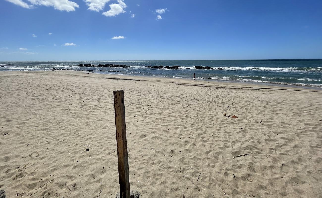 El Tamarindo Beach'in fotoğrafı açık bej kum yüzey ile
