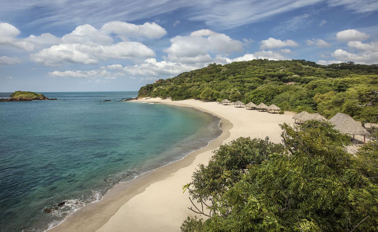 Manzanillo Plajı'in fotoğrafı parlak kum yüzey ile