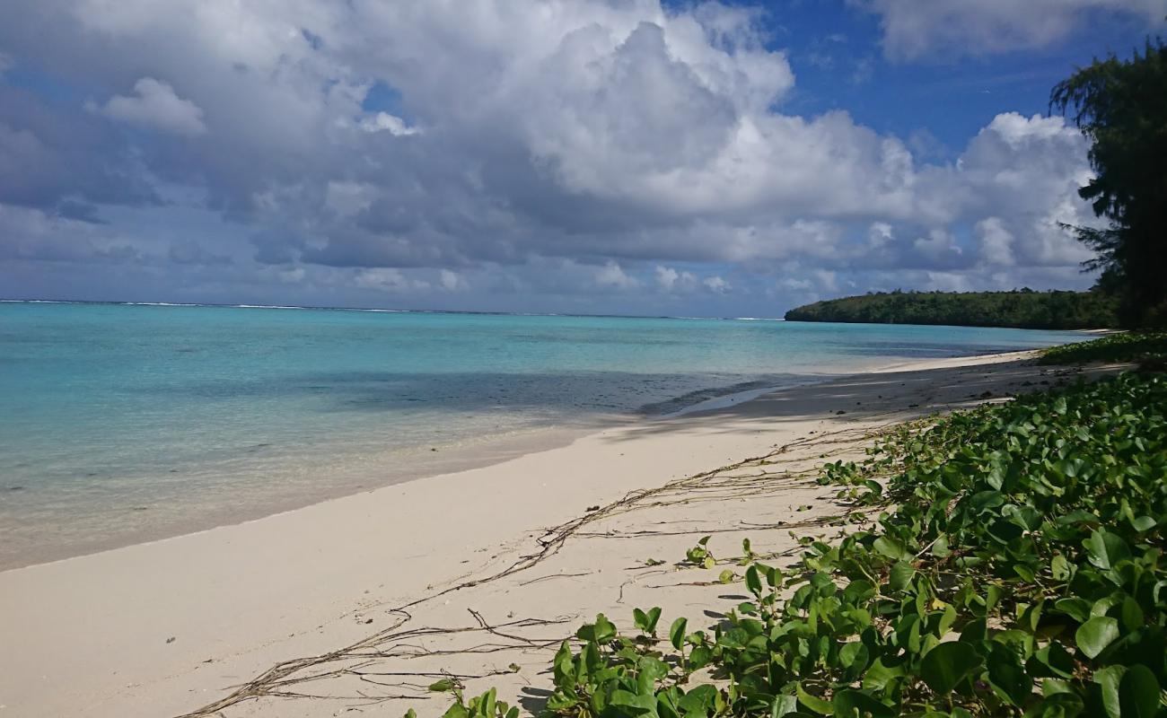 Tanapag Beach'in fotoğrafı parlak kum yüzey ile