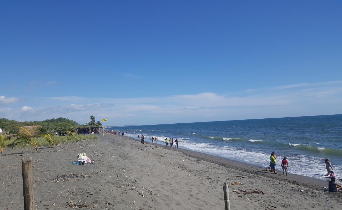 Playa de Estero Rico'in fotoğrafı kahverengi kum yüzey ile