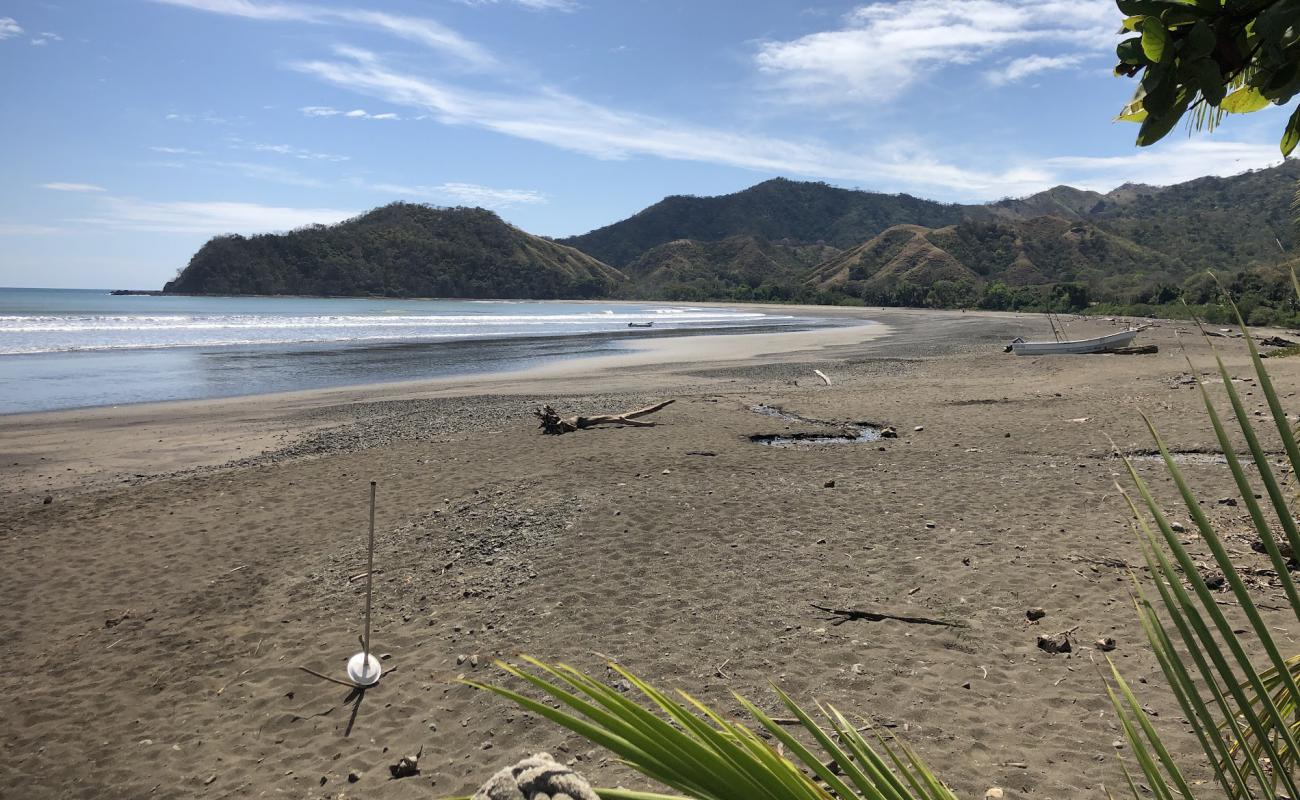 Guanico Abajo Beach'in fotoğrafı kahverengi kum yüzey ile