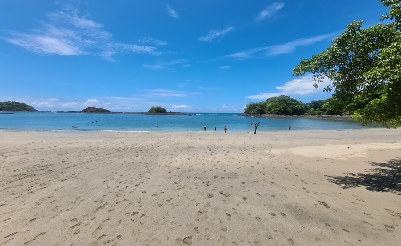 Achotines Beach'in fotoğrafı gri kum yüzey ile