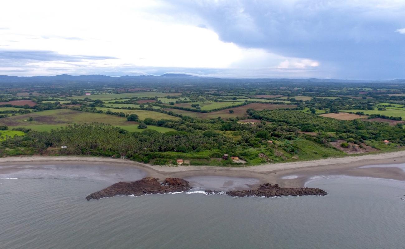 Jobo Beach'in fotoğrafı kahverengi kum yüzey ile