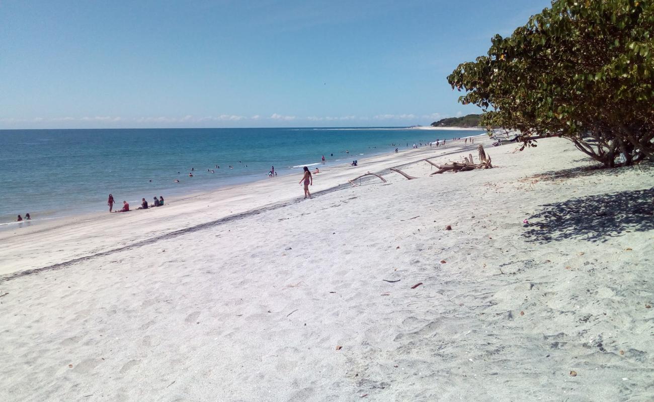 Hermita Beach'in fotoğrafı gri kum yüzey ile