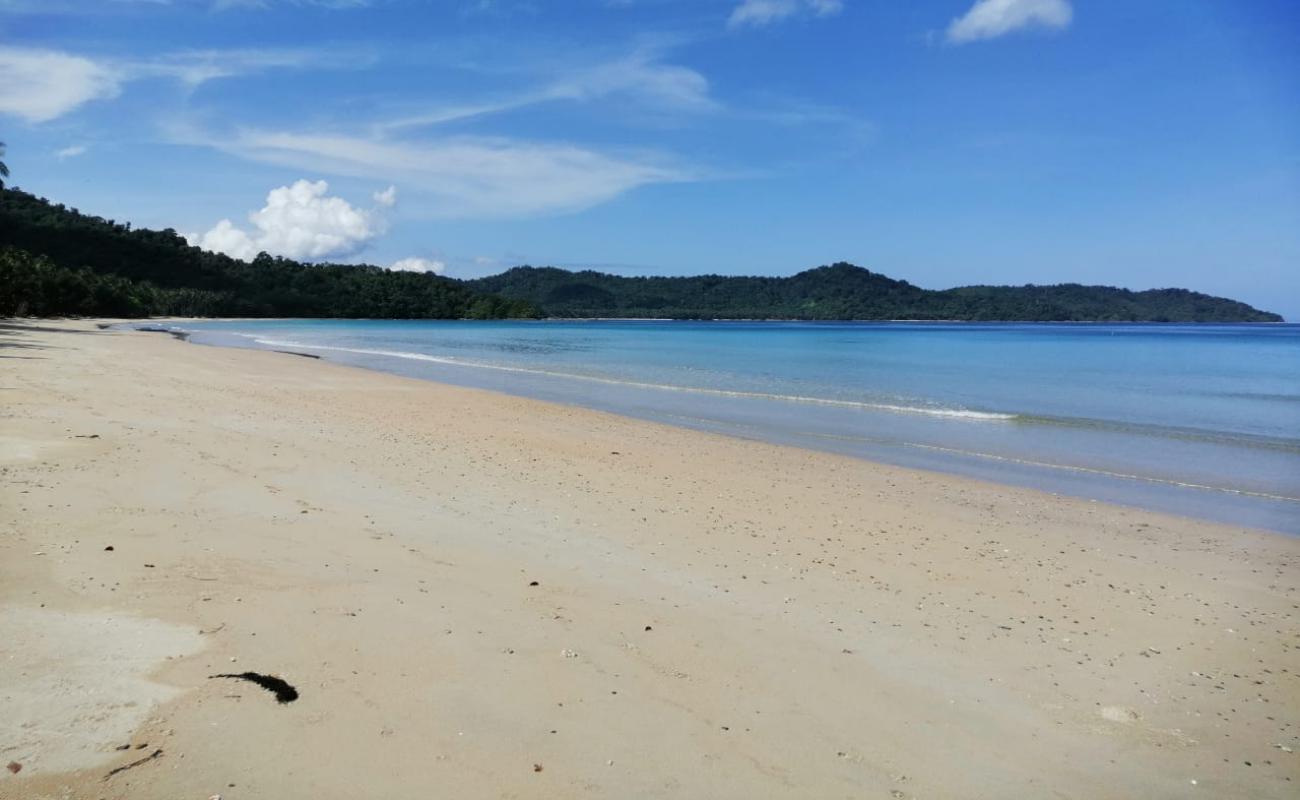 Lumindas Beach'in fotoğrafı açık bej kum yüzey ile