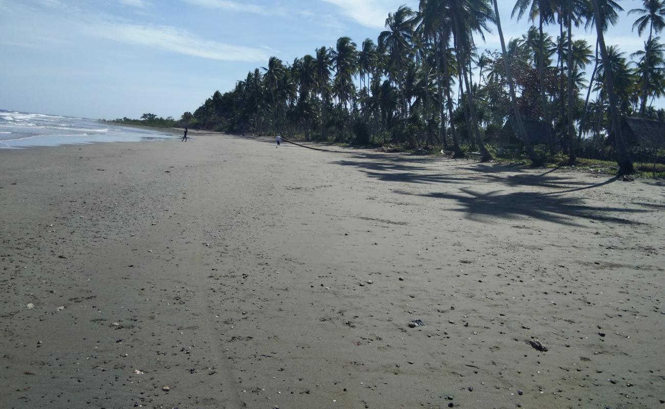Kamuning Beach'in fotoğrafı açık bej kum yüzey ile