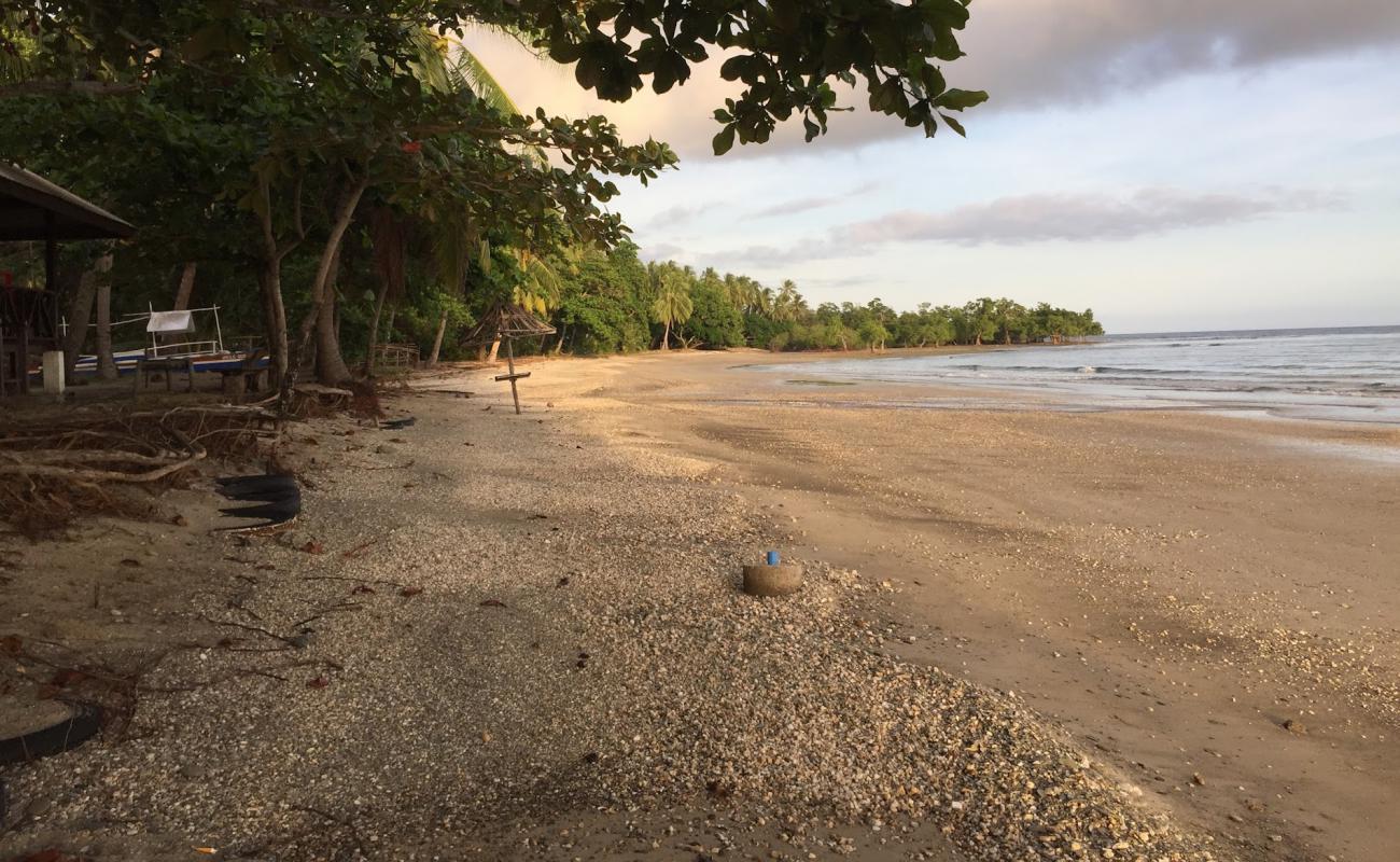 Langogan Beach'in fotoğrafı açık bej kum yüzey ile