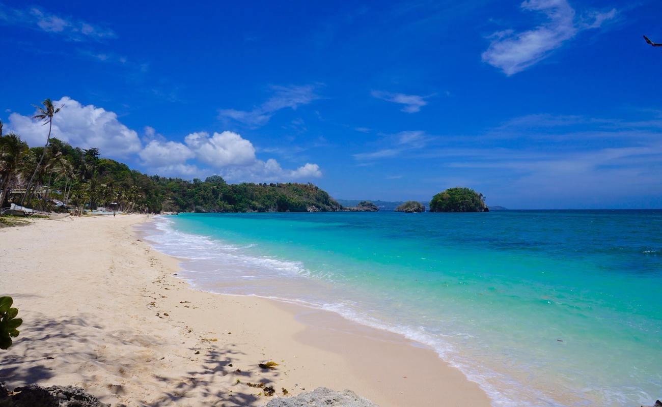 Iligan Beach'in fotoğrafı parlak ince kum yüzey ile