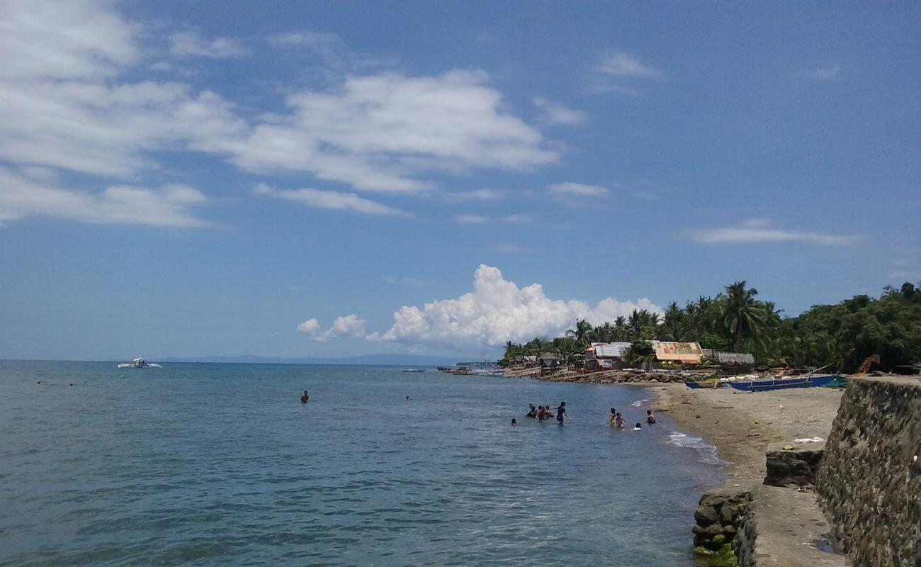 Ajong Beach'in fotoğrafı gri kum ve çakıllar yüzey ile