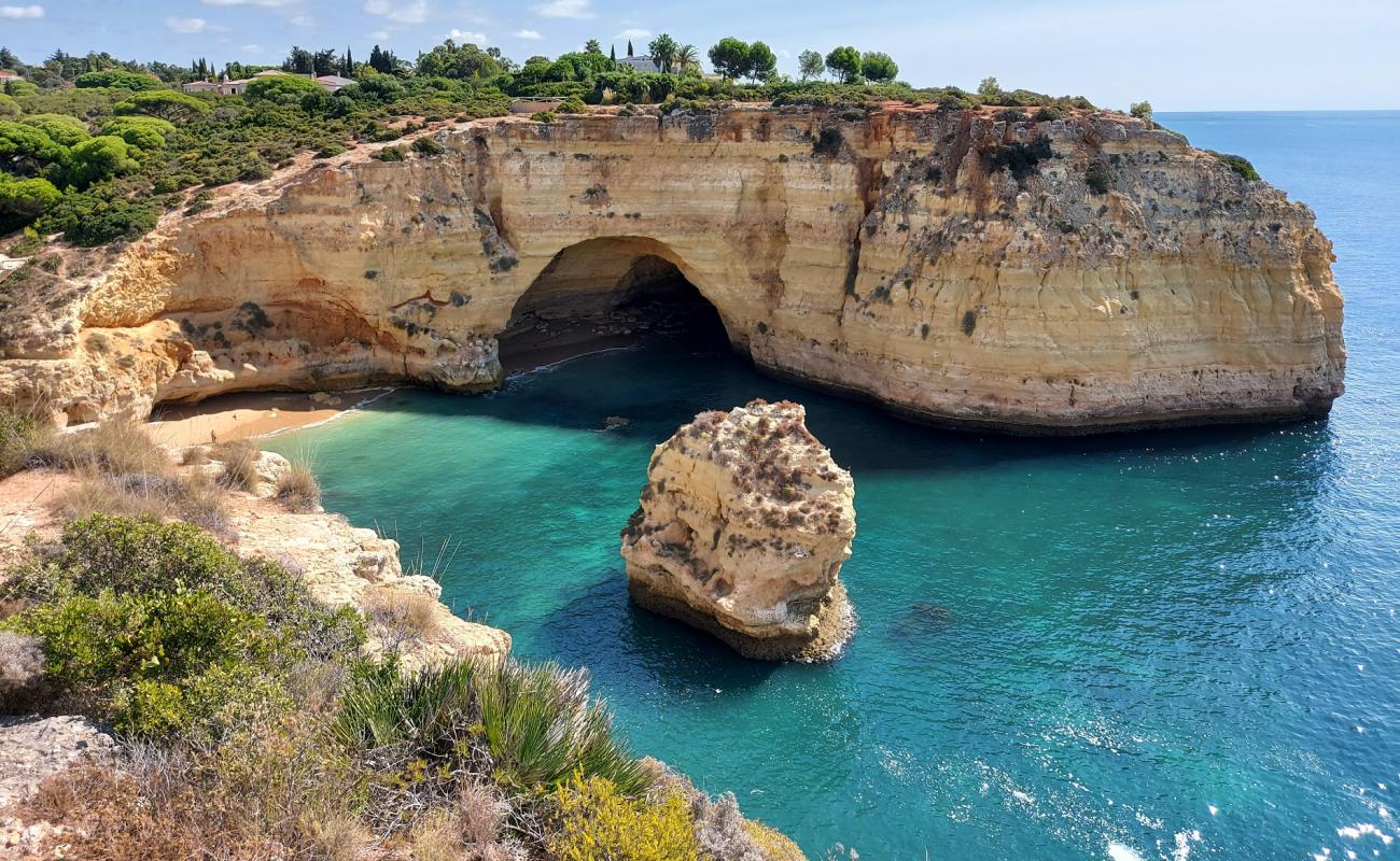 Vale Covo'in fotoğrafı parlak kum ve kayalar yüzey ile