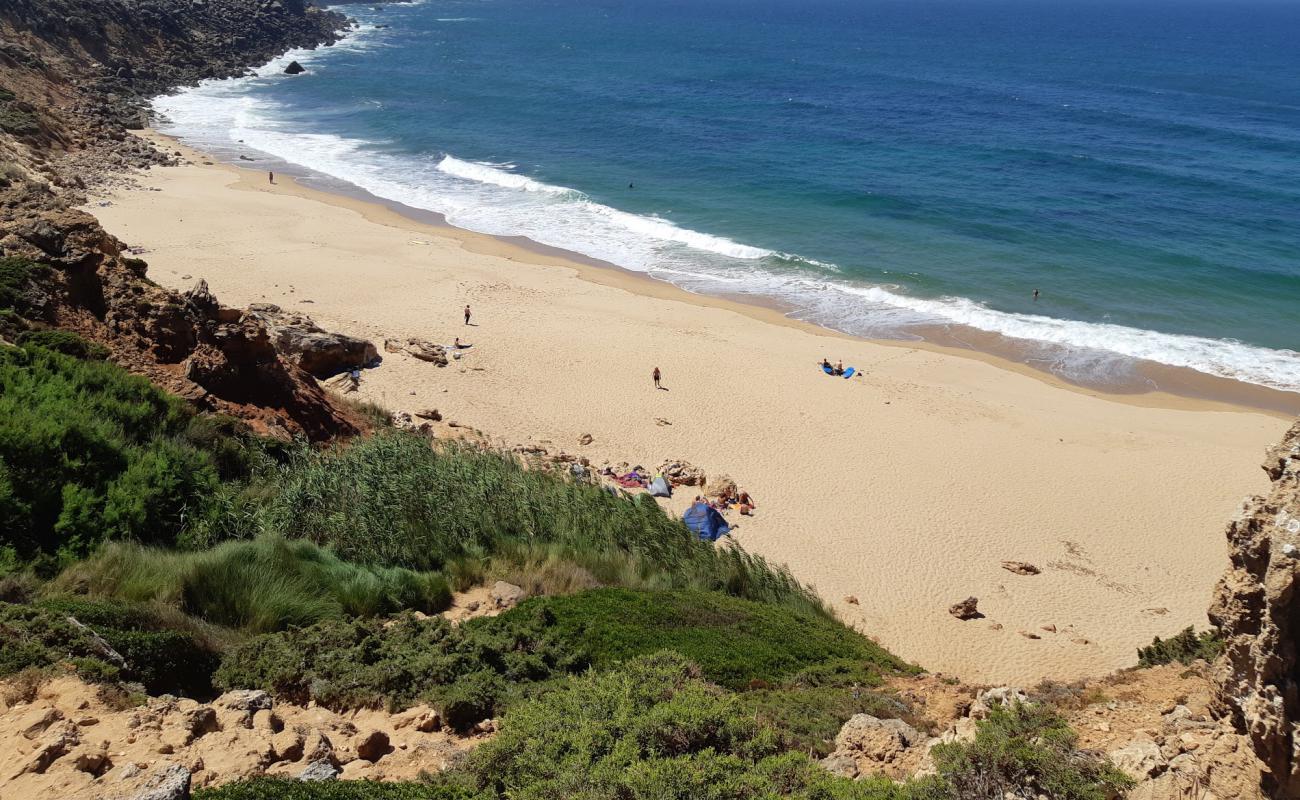 Praia do Telheiro'in fotoğrafı kahverengi kum yüzey ile