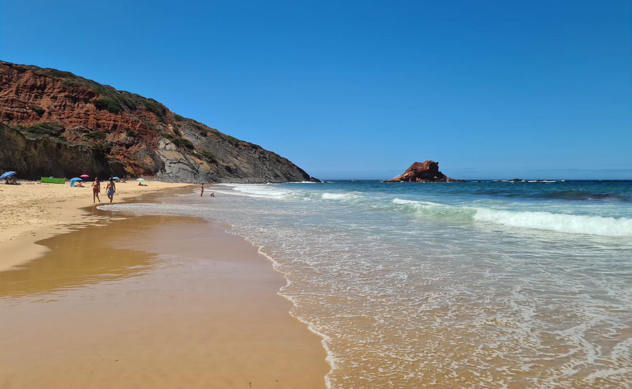 Ponta Ruiva Beach'in fotoğrafı kahverengi kum yüzey ile