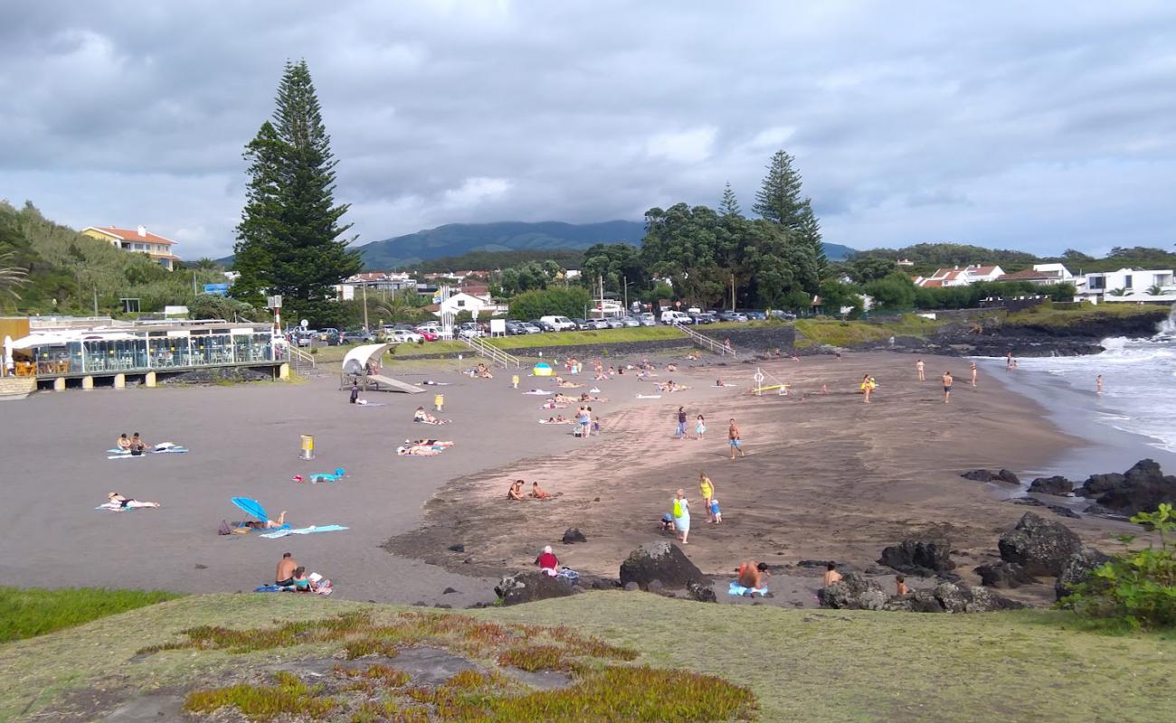 Praia do Populo'in fotoğrafı kahverengi kum yüzey ile