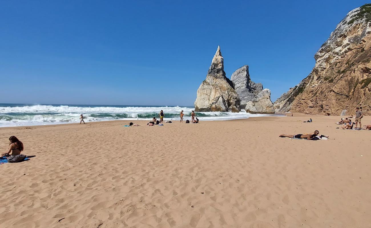 Praia da Aroeira'in fotoğrafı parlak kum yüzey ile