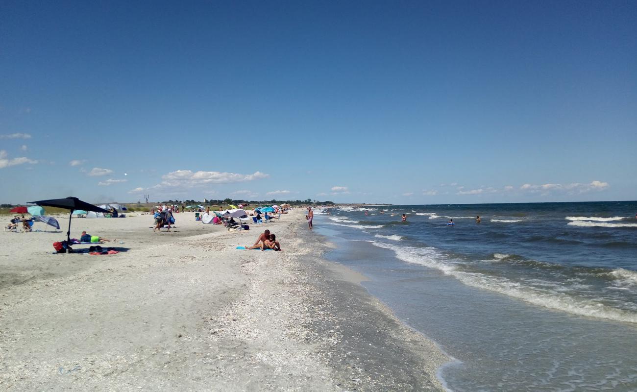 Corbu beach'in fotoğrafı açık bej kum yüzey ile