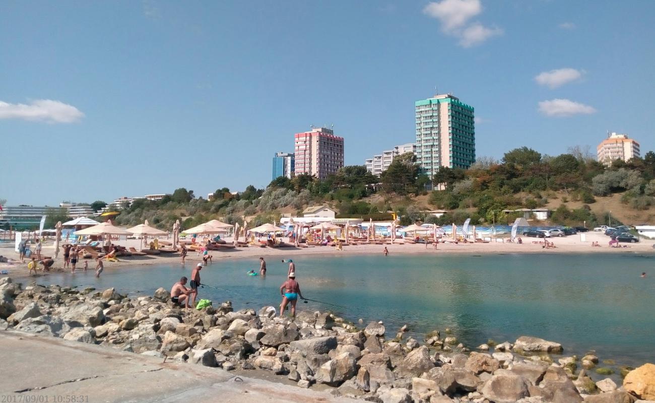 Poseidon beach'in fotoğrafı açık bej kum yüzey ile