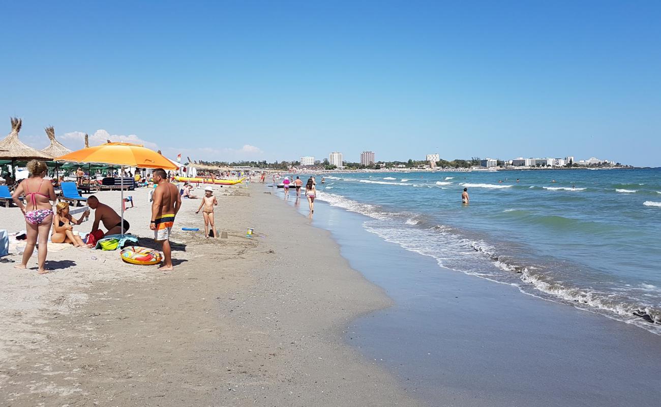 Reef beach'in fotoğrafı gri kum yüzey ile