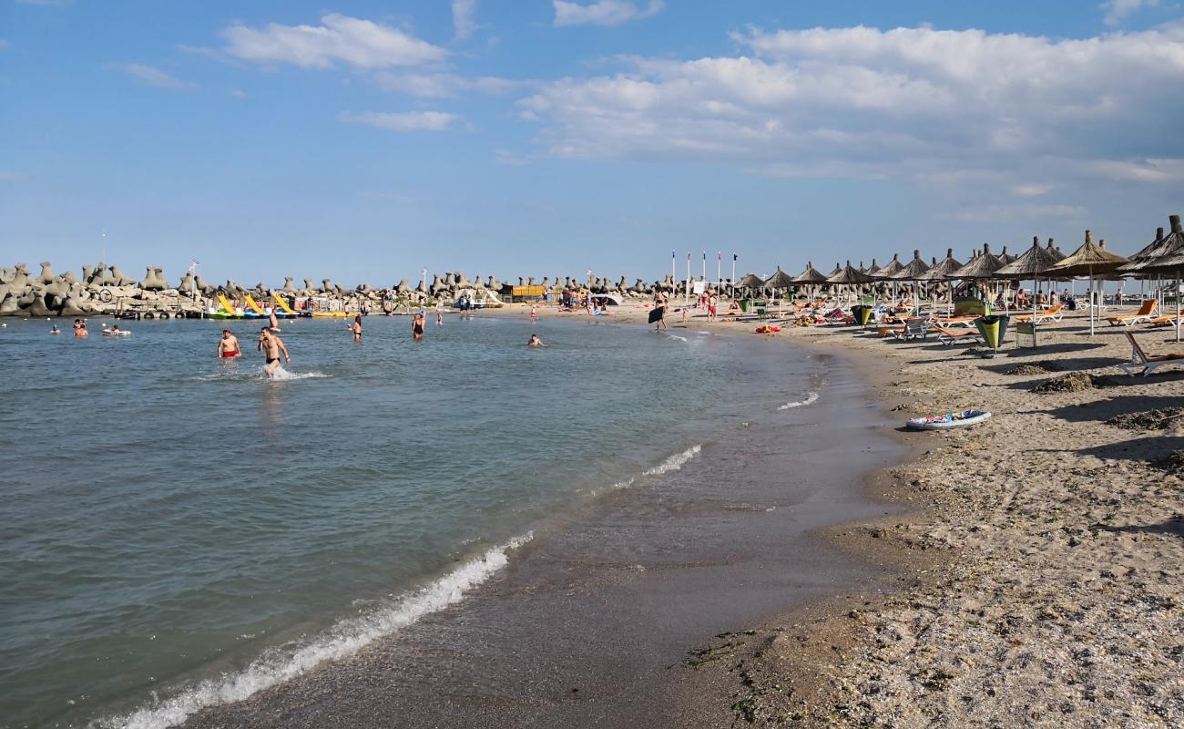 Saturn beach'in fotoğrafı açık bej kum yüzey ile