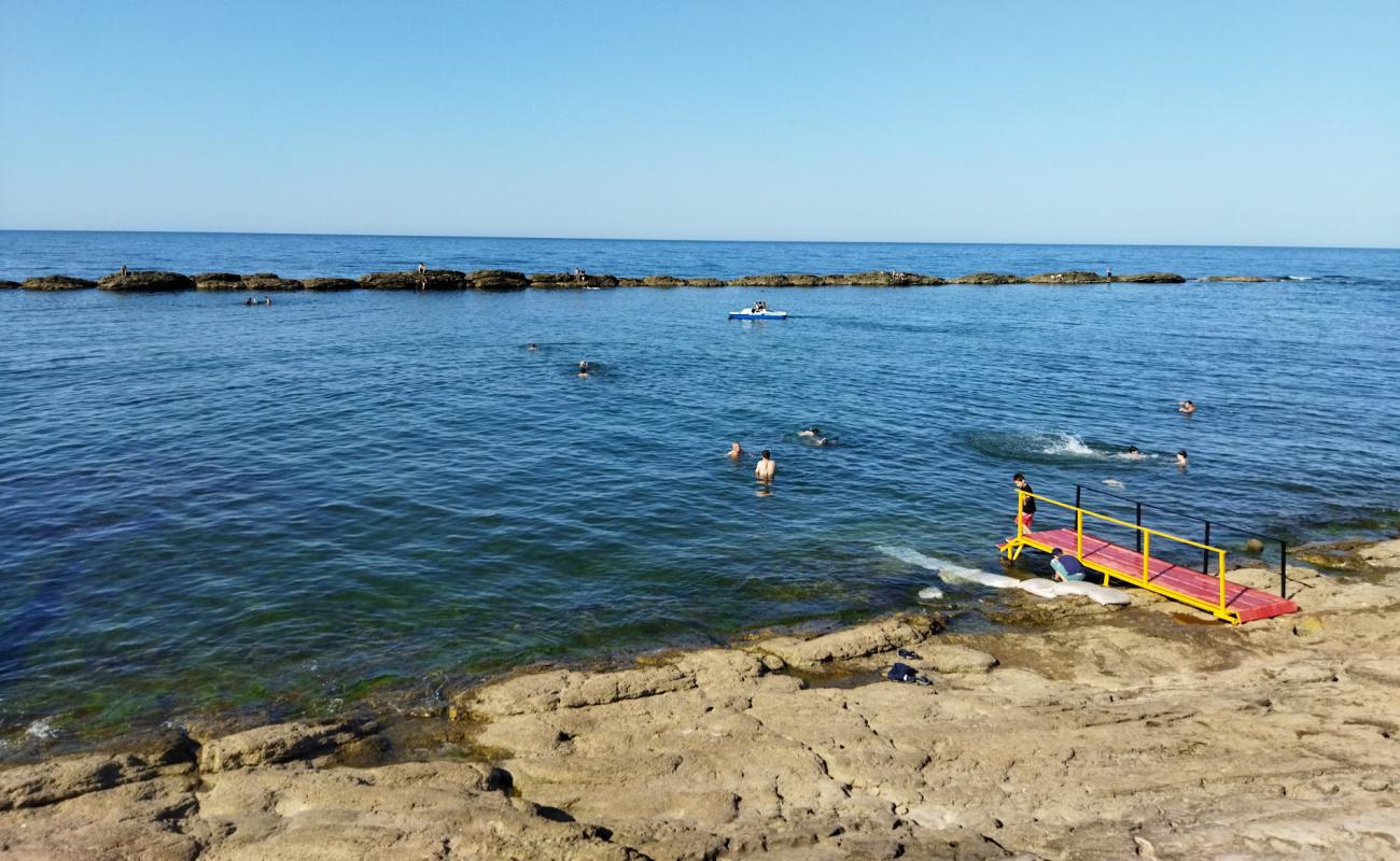 Izberbash Beach'in fotoğrafı açık bej kum yüzey ile