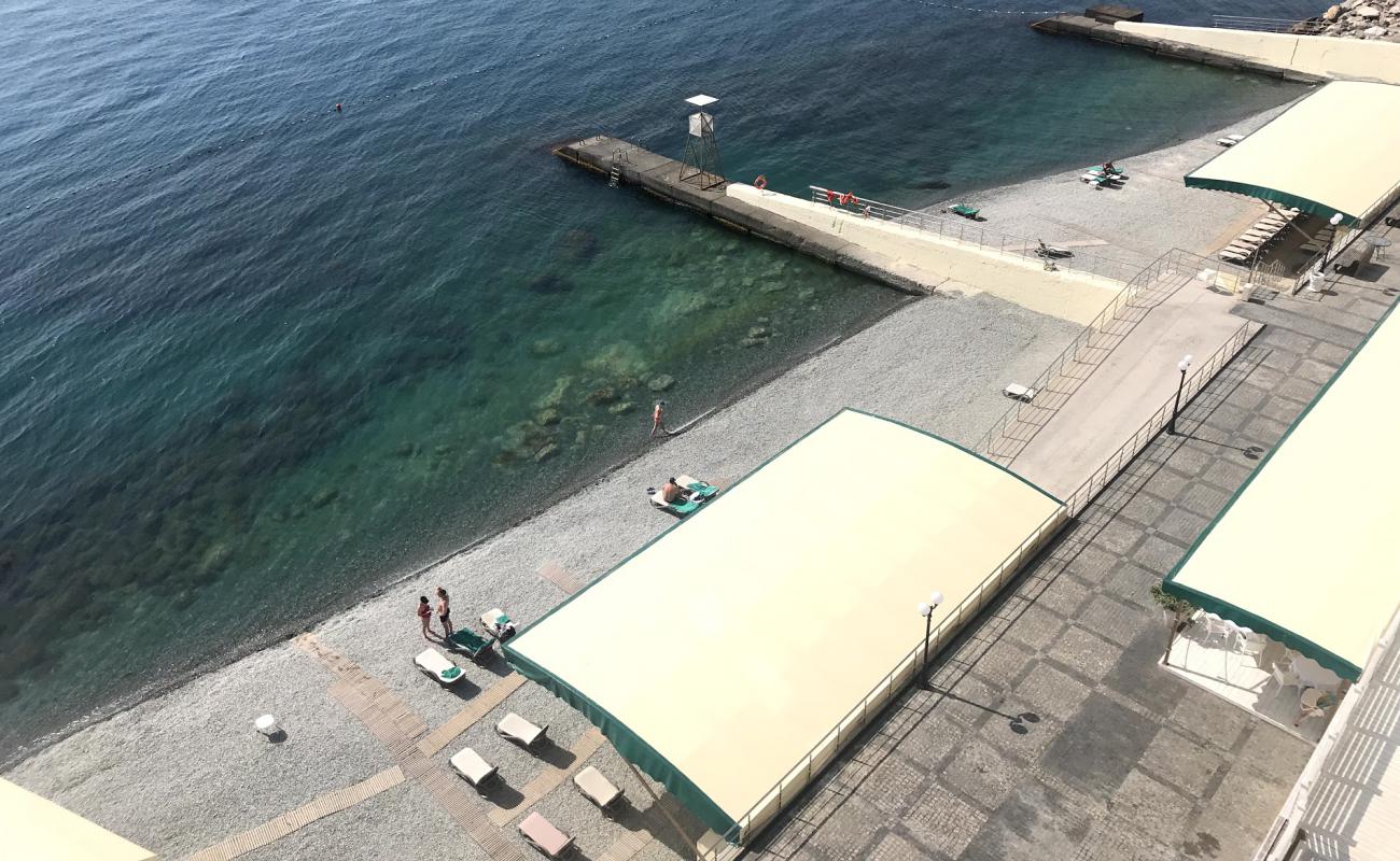 Palmira beach'in fotoğrafı gri çakıl taşı yüzey ile