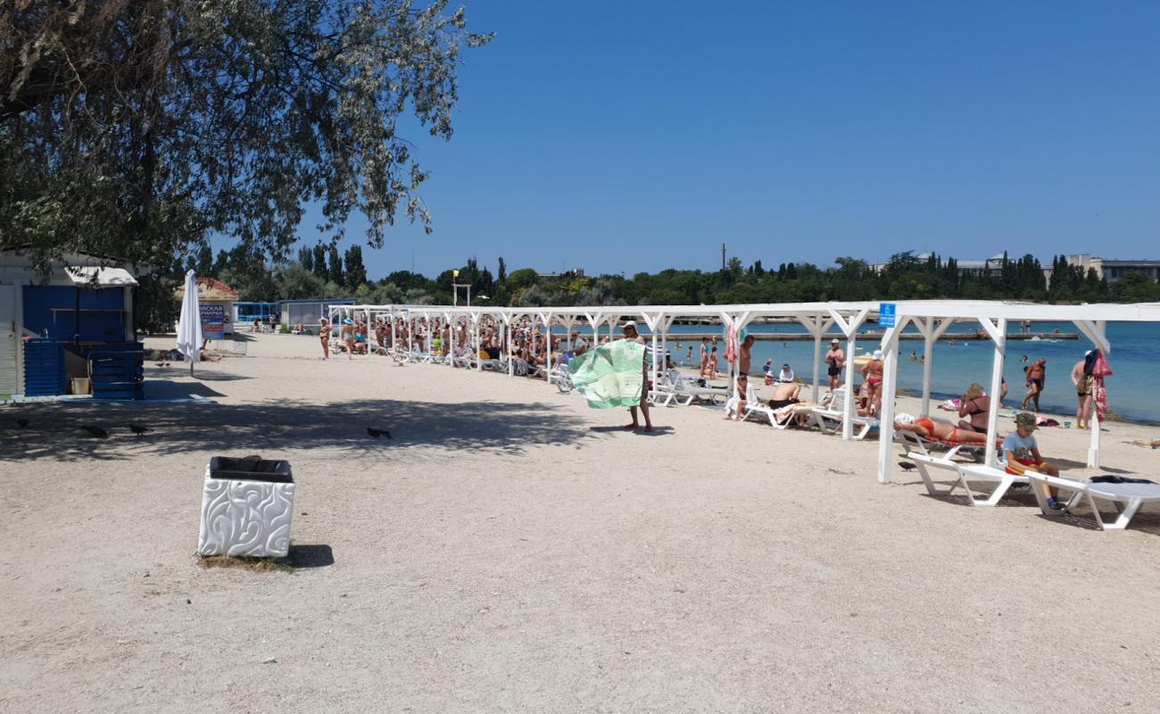 Omega beach'in fotoğrafı parlak kum yüzey ile