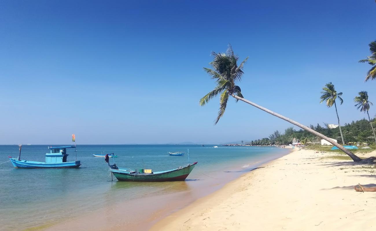 Thai Tan Tien'in fotoğrafı i̇nce bej kum yüzey ile