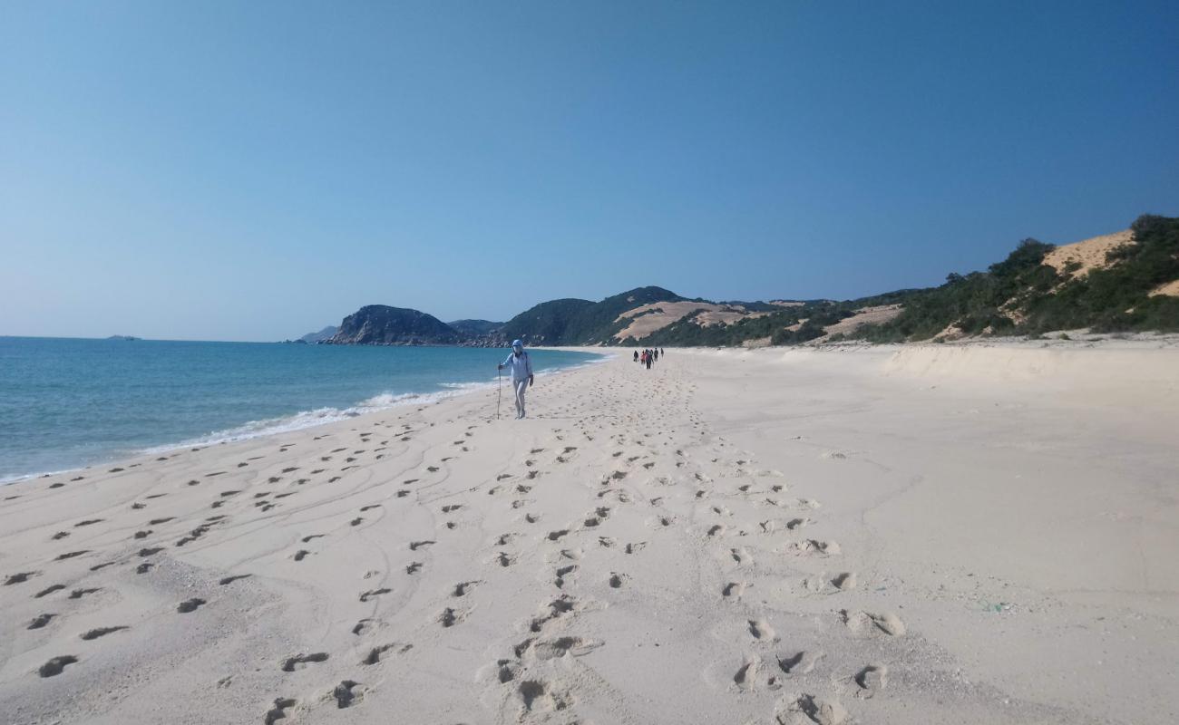 Na Beach'in fotoğrafı parlak kum yüzey ile