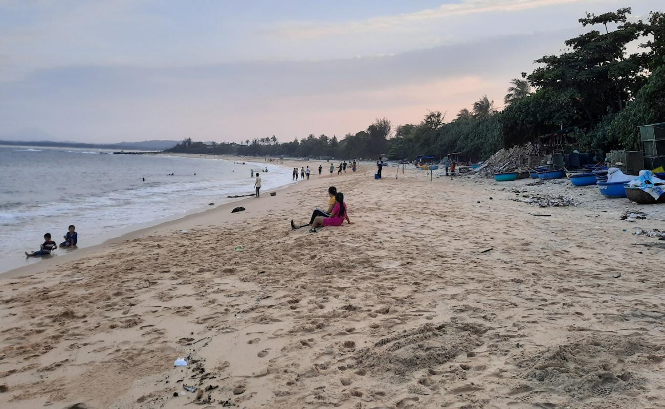 Yen Beach'in fotoğrafı bej kum ve kayalar yüzey ile