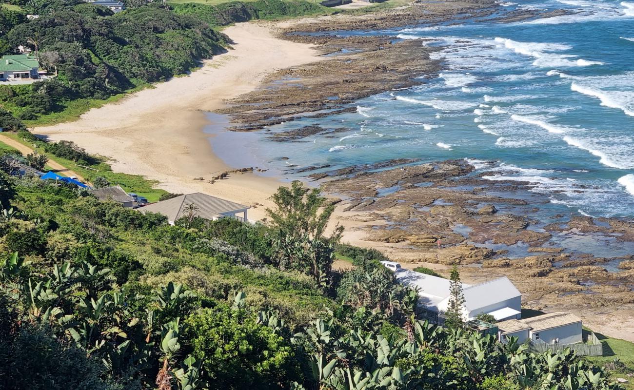Haga Haga beach'in fotoğrafı bej kum ve kayalar yüzey ile