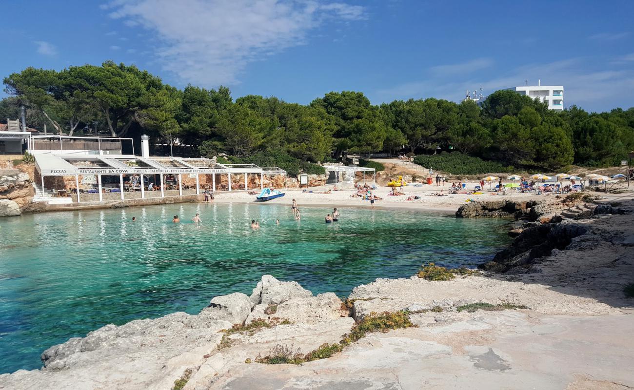 Playa Cala Blanca'in fotoğrafı parlak ince kum yüzey ile