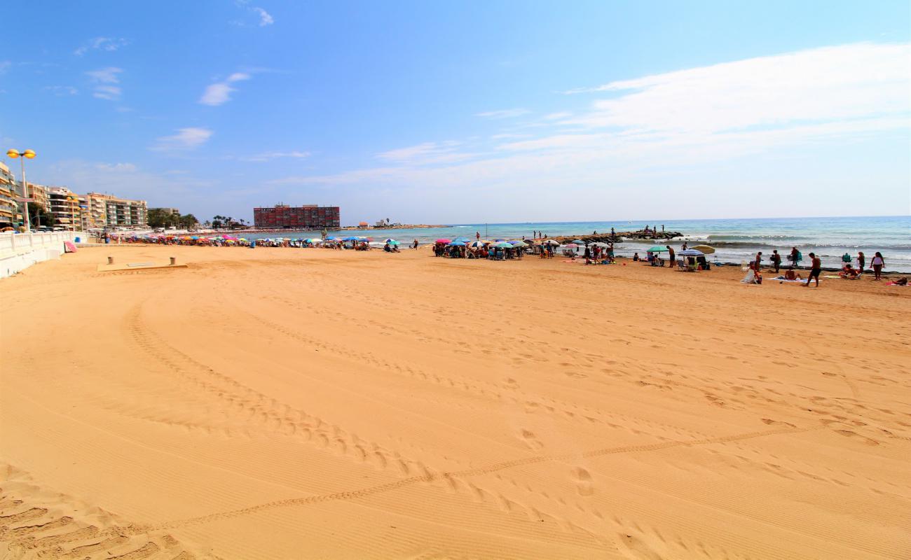 Playa de los Locos'in fotoğrafı kahverengi kum yüzey ile