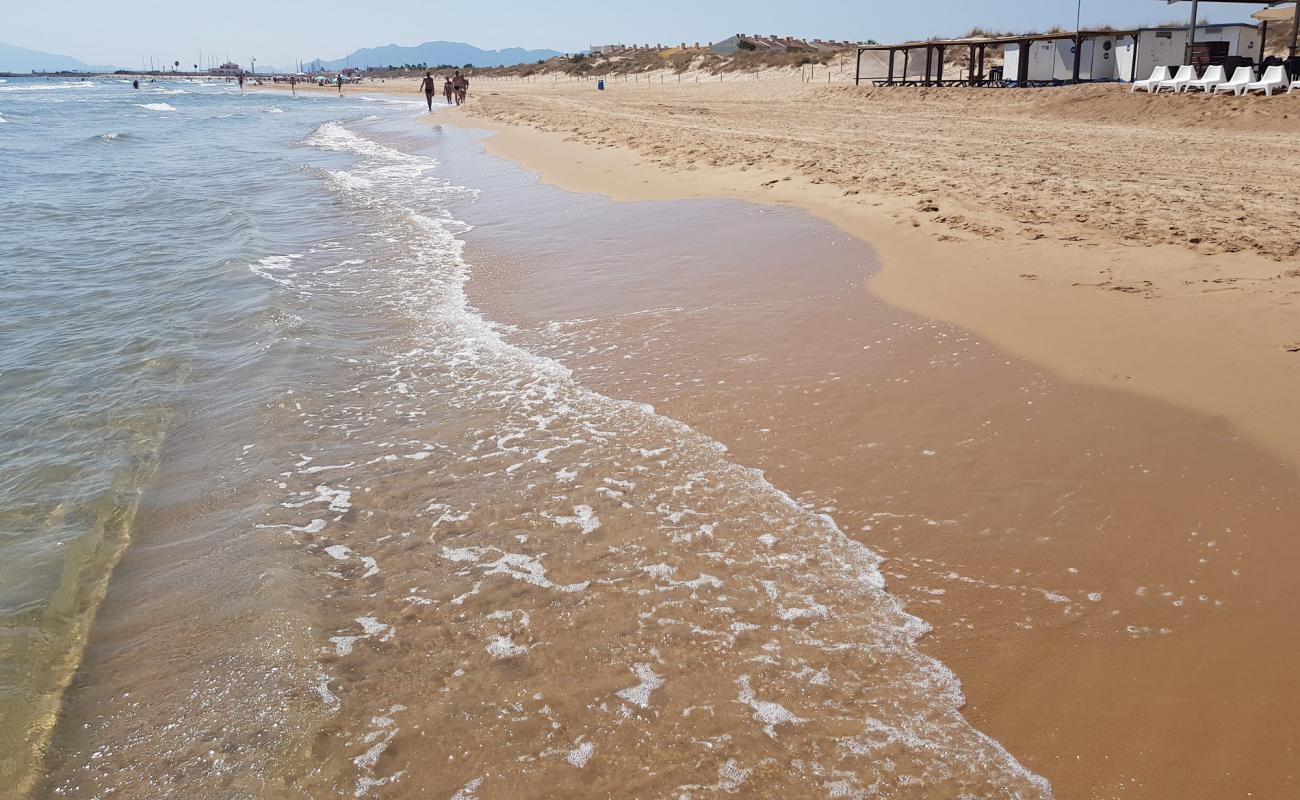 Platja Aigua Blanca'in fotoğrafı kahverengi kum yüzey ile