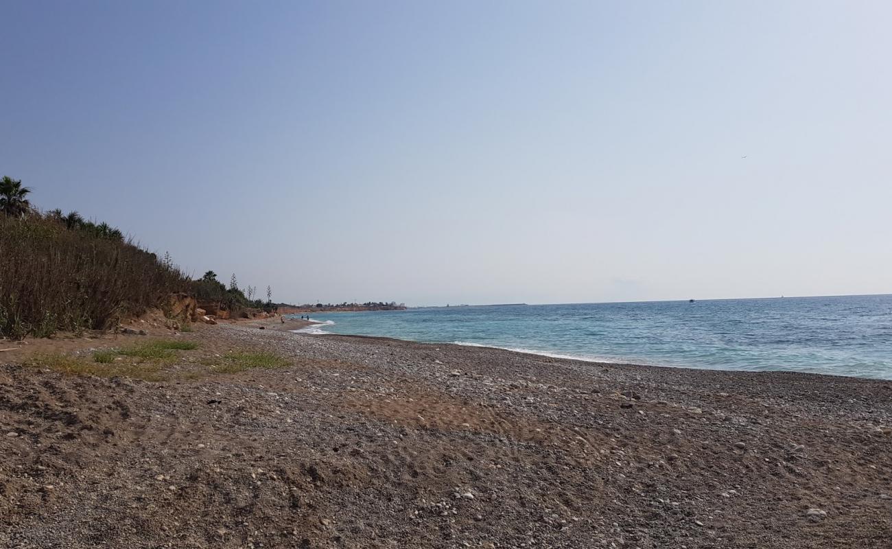 Playa Perrochos'in fotoğrafı gri çakıl taşı yüzey ile