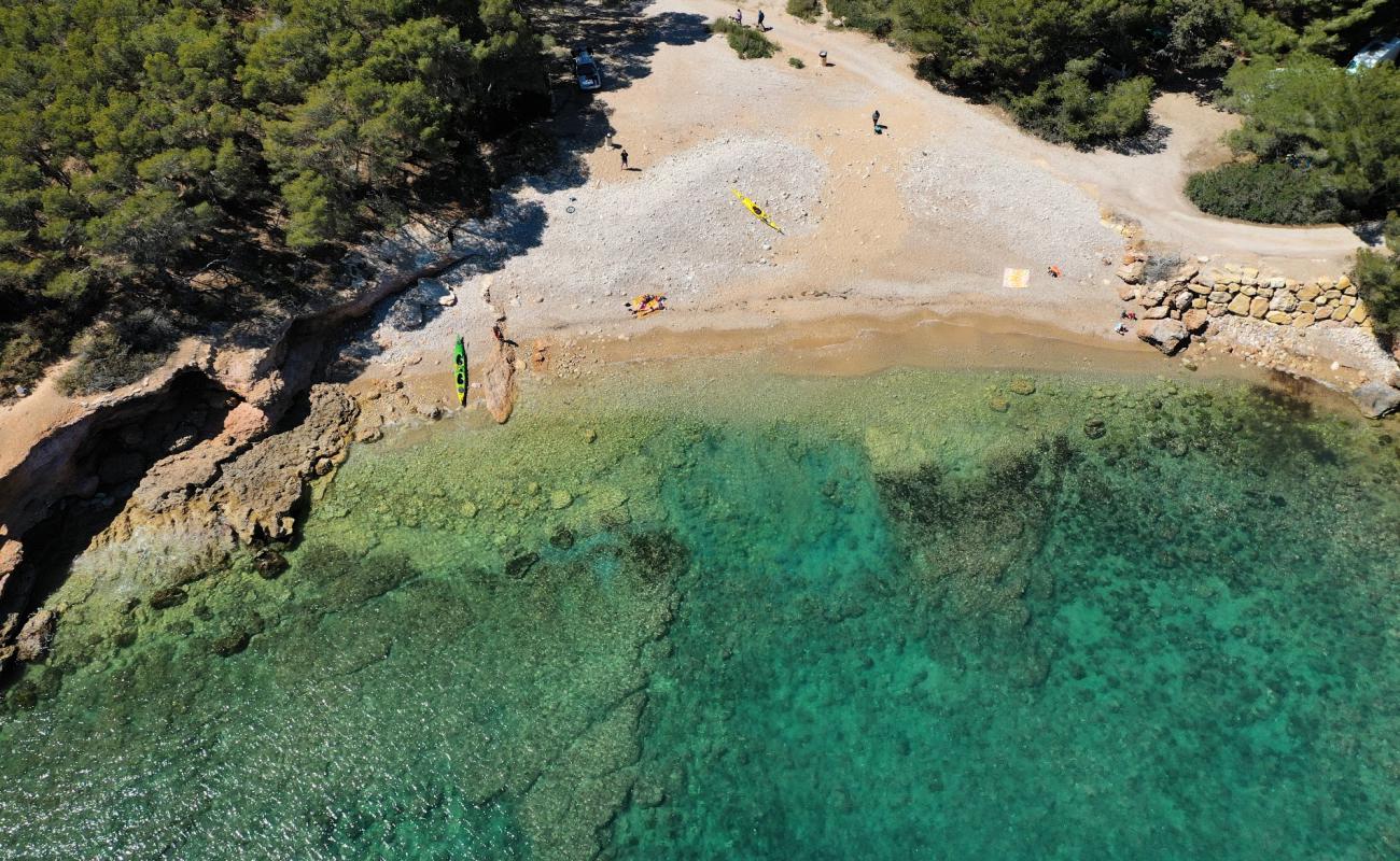 Platja Port Olivet'in fotoğrafı bej çakıl yüzey ile