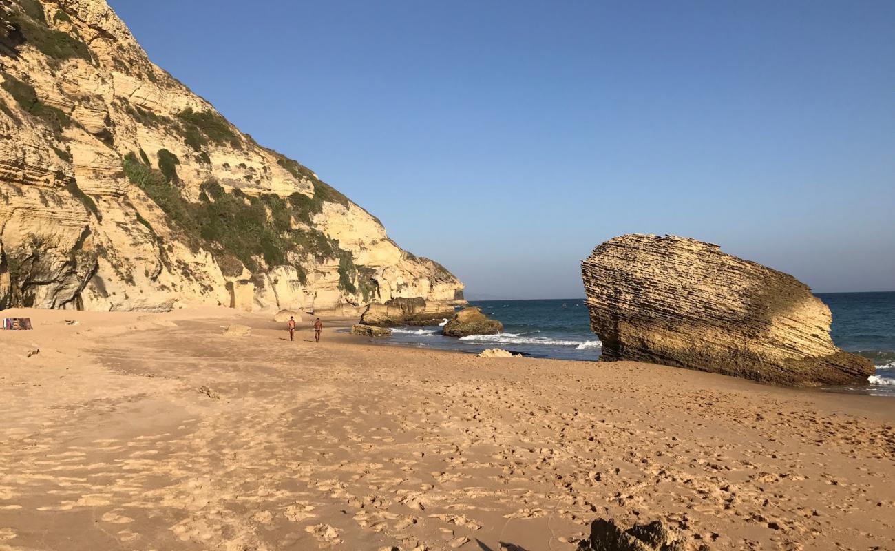 Playa de la Cortina'in fotoğrafı parlak ince kum yüzey ile