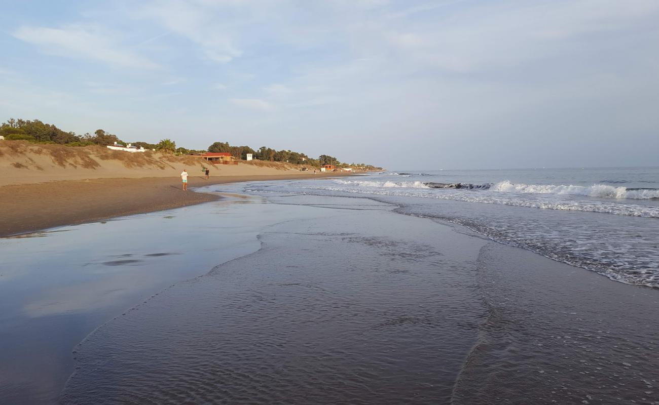 Playa del Rosario'in fotoğrafı gri kum yüzey ile