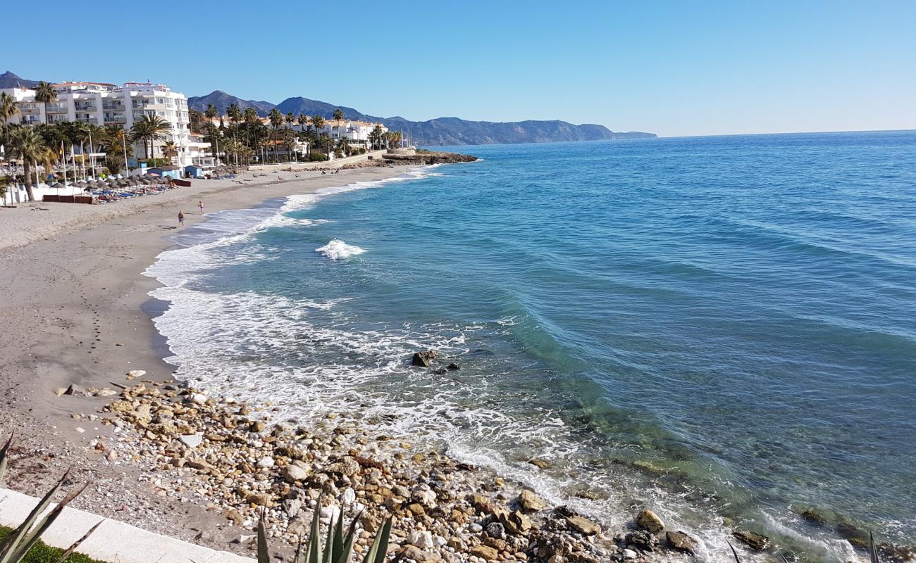 Playa de la Torrecilla'in fotoğrafı gri kum yüzey ile