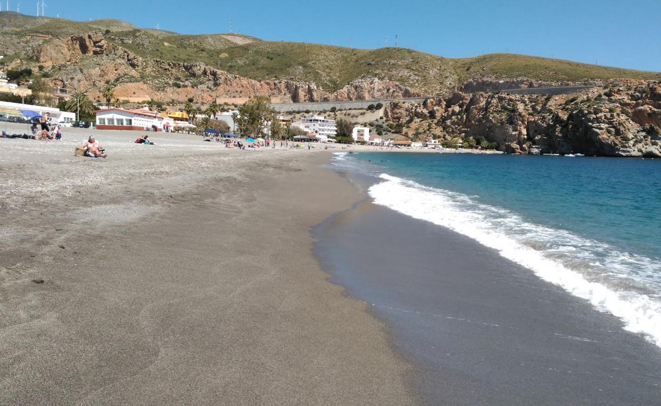 Guainos beach'in fotoğrafı küçük bej çakıl yüzey ile