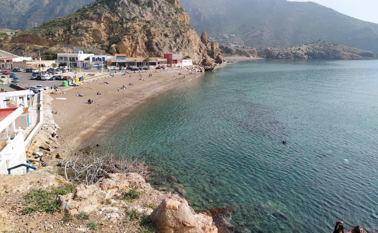 Playa El Portus'in fotoğrafı siyah kum ve çakıl yüzey ile