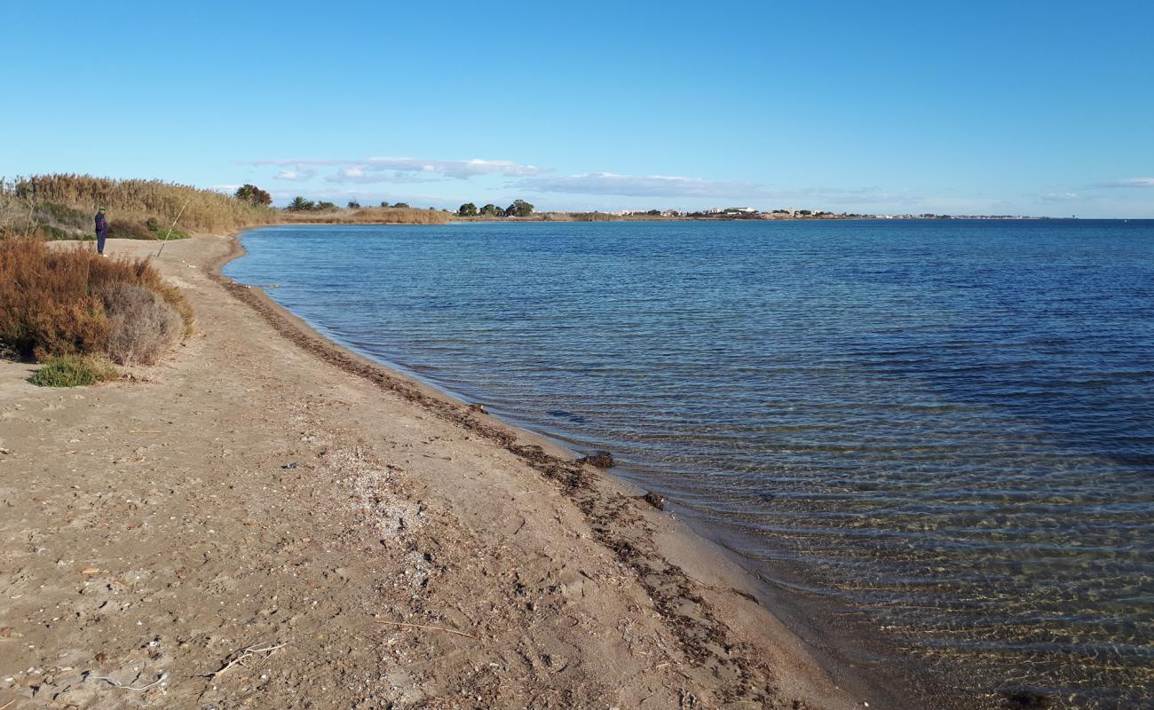 Playa el Carmoli'in fotoğrafı koyu kum yüzey ile