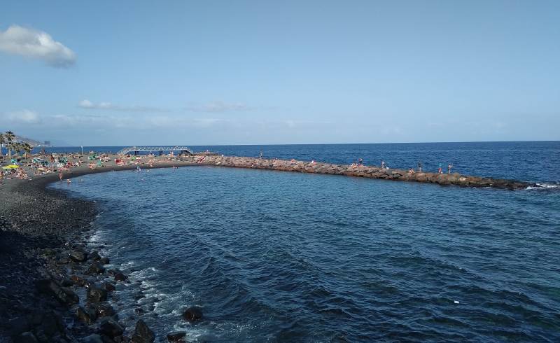 Playa La Arenita'in fotoğrafı gri kum ve çakıl yüzey ile