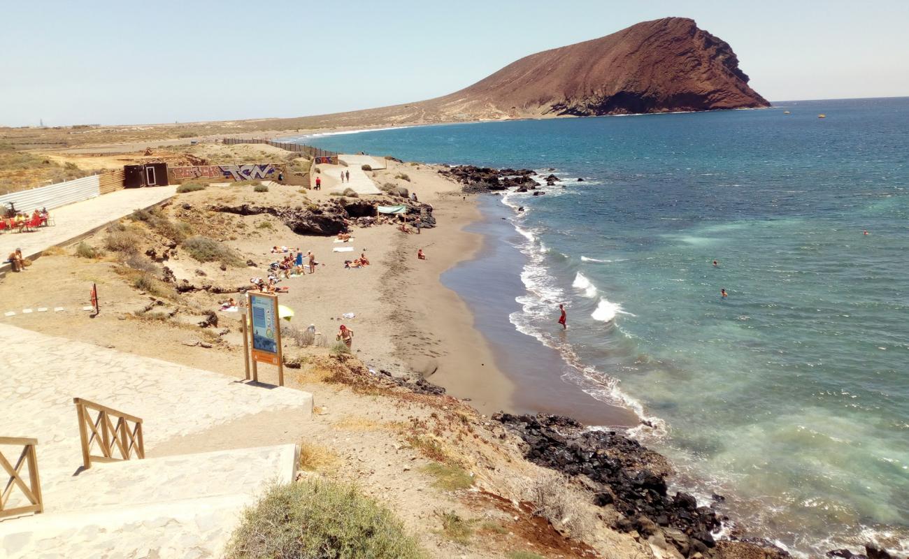 Playa de Sotavento'in fotoğrafı kahverengi kum yüzey ile