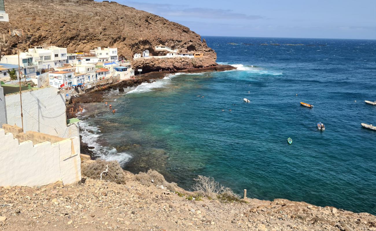 Tufia beach'in fotoğrafı kayalık arazi yüzey ile